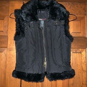 Cute girl’s black vest